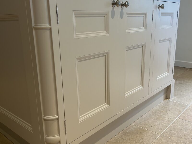 Cream shaker kitchen island with granite worktop