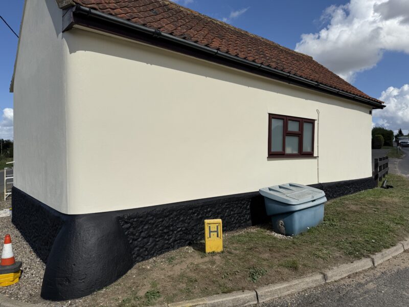 Cream bungalow exterior with red tiled roof